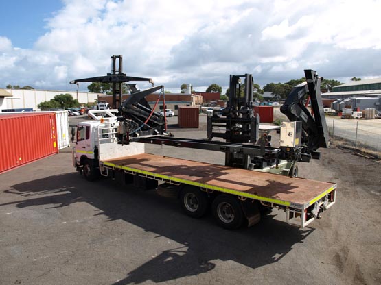 140 mounted with a forklift