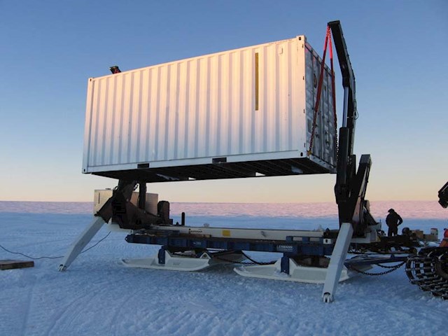 Self-loading container sledge